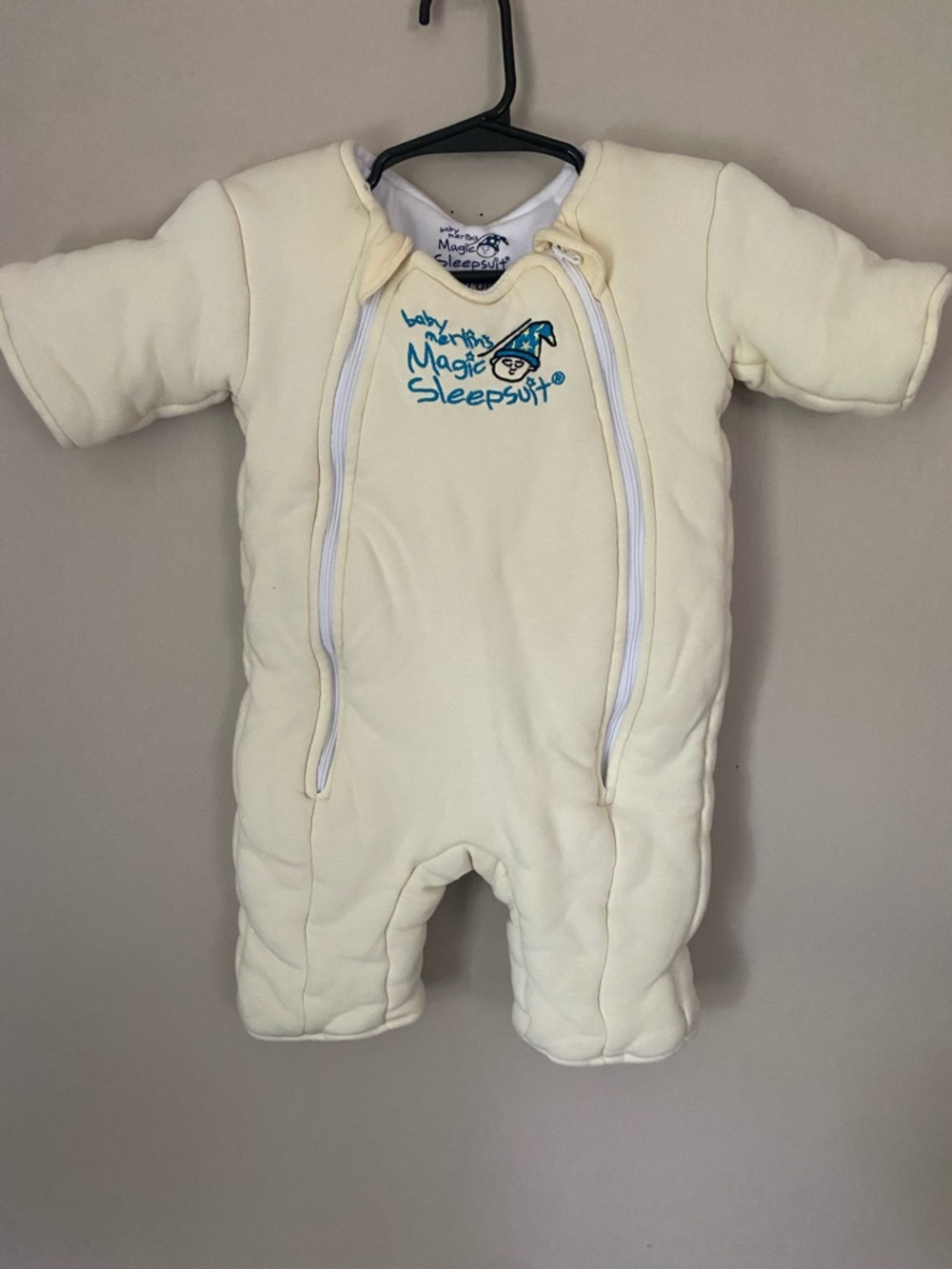 Magic Sleepsuit Cream Baby One-Piece Footie with Blue Logo